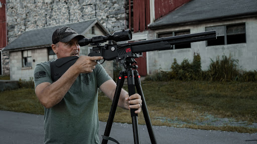 Umarex Origin .22 caliber pcp rifle being shot from a tripod by Rick Rehm @shooter1721